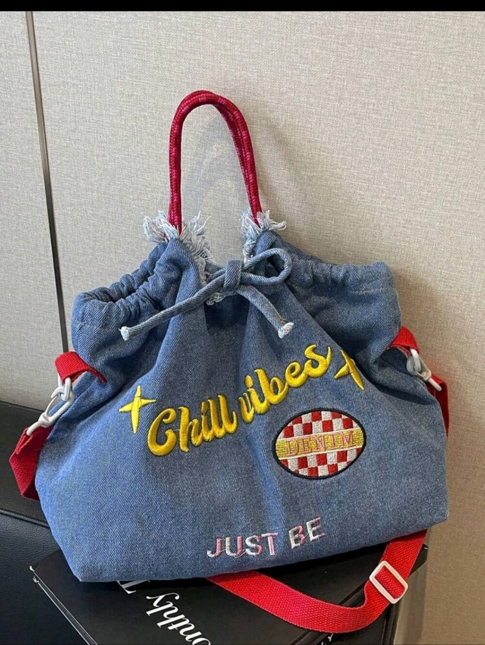 Chill Vibes Denim Drawstring Tote Bag in Blue with Red Strap
